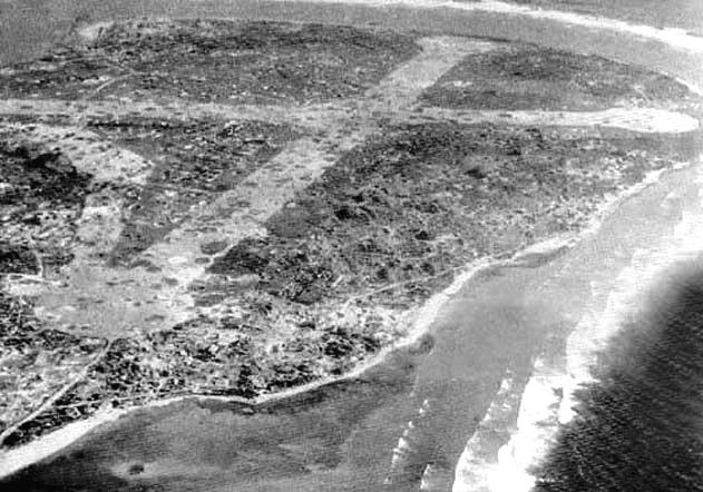 Bombing results on the Japanese airstrip at Taroa Island, Maloelap Atoll, Marshall Islands, 1945.  Despite the pounding delivered to this site, war’s end found 3 fire control facilities and 40 anti-aircraft guns still operational