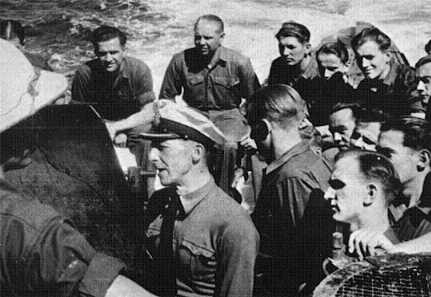 Korvettenkapitän Werner Hartenstein of U-156 addressing his crew somewhere in the Atlantic Theater, 1942-43.