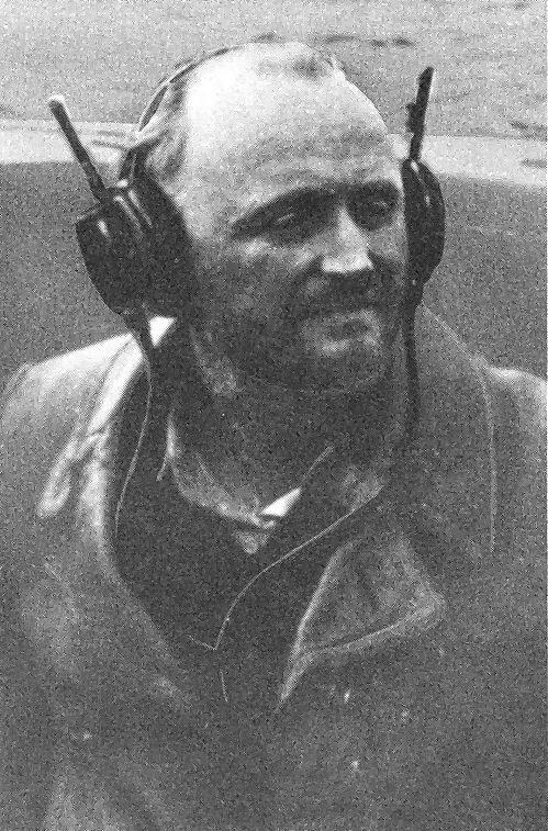 Civilian technician Dr. Kurt Sommermeyer aboard U-537 in the Labrador Sea listening to signals transmitted by Weather Station Kurt (named for Sommermeyer) broadcasting from the Labrador coast, 24 Oct 1943.