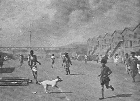 People running for safety near the cargo ship Fort Stikine explosion, Victoria Dock, Bombay, India, 14 Apr 1944