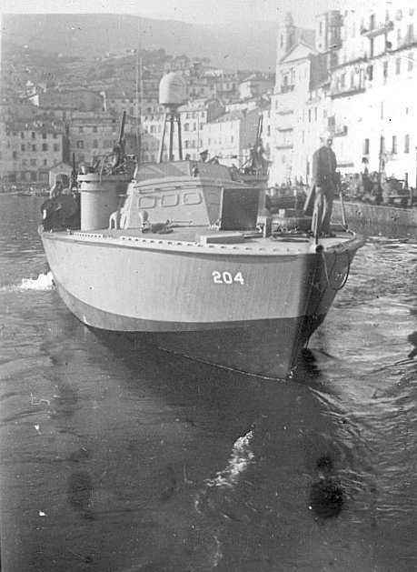 PT-204, a Higgins 78-footer of Motor Torpedo Boat Squadron 15 (MTBRon 15) in Bastia harbor, Corsica, France, May 1944.