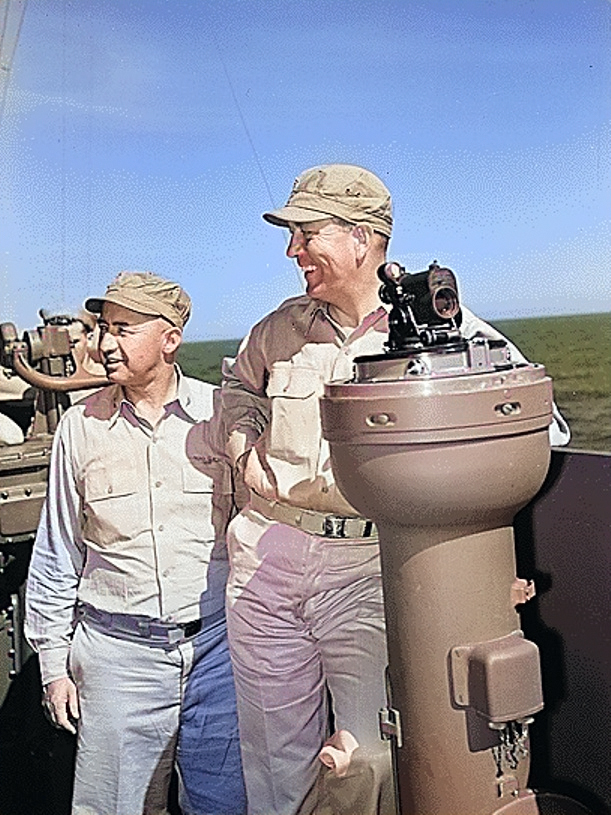 Captain J.J. Clark and Rear Admiral Arthur Radford on the bridge of the USS Yorktown (Essex-class), Oct 1943. [Colorized by WW2DB]