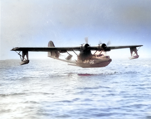 PBY Catalina landing in the water near Naval Air Station Jacksonville, Florida, United States, 1940s [Colorized by WW2DB]