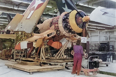 F4U-1 Corsair fighter under construction, United States, circa 1944 [Colorized by WW2DB]