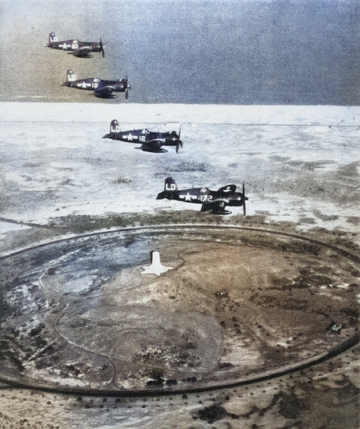 F4U-4 Corsair fighters of US Marine Corps squadron VMF-212 in flight over Wright Memorial, Kitty Hawk, North Carolina, United States, 17 Dec 1948; seen in Feb 1949 issue of US Navy publication Naval Aviation News [Colorized by WW2DB]