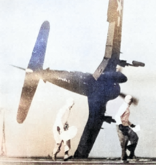 F4U-4 Corsair fighter in the midst of a failed carrier landing attempt on USS Sicily, 1949; seen in Nov 1978 issue of US Navy publication Naval Aviation News [Colorized by WW2DB]