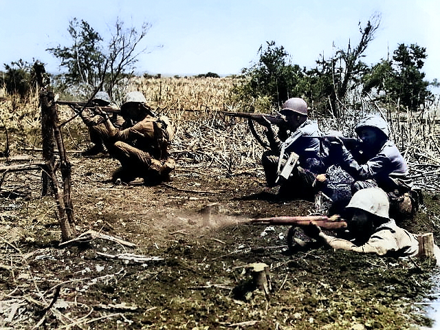 US Marines during mop-up operations at Tinian, Mariana Islands, Aug 1944 [Colorized by WW2DB]