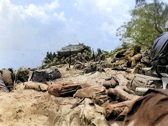 Americans landing on Red Beach #2, Saipan, Mariana Islands, at 1300 on 15 Jun 1944 [Colorized by WW2DB]