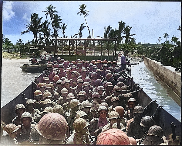 Americans landing on Carlos Island, Marshall Islands, circa early Feb 1944 [Colorized by WW2DB]