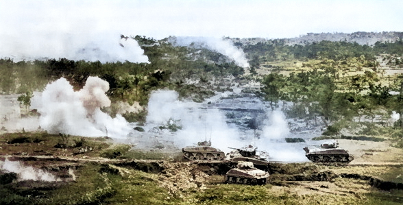 M4 Sherman tanks operating on Okinawa, Japan, circa Jun 1945; note tank in center had been disabled [Colorized by WW2DB]