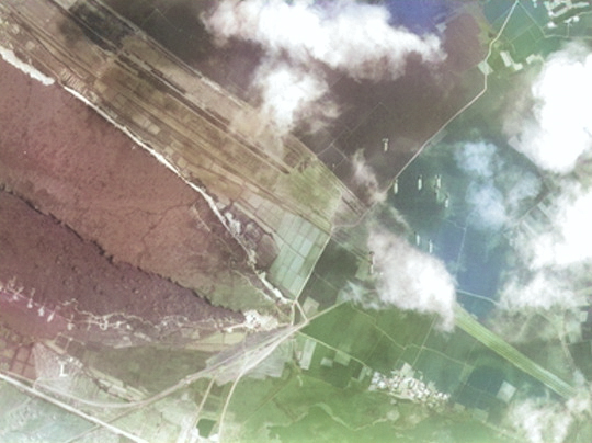 Bombing dropping on the rail station at Toshien District, Takao (now Zuoying District, Kaohsiung), Taiwan, 16 Oct 1944 [Colorized by WW2DB]