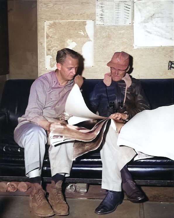 Commodore Burke and Vice Admiral Mitscher aboard carrier Bunker Hill while off Japan, Feb 1945 [Colorized by WW2DB]