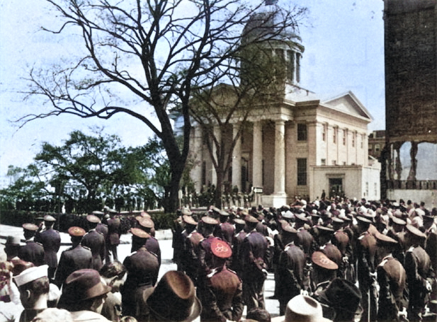 American military servicemen gathering outside of the MacArthur Memorial for last rites, Norfolk, Virginia, United States, 9 Apr 1964 [Colorized by WW2DB]