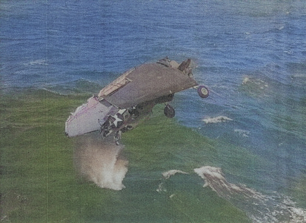 TBF-1C aircraft having just been jettisoned from USS Coral Sea near Kwajalein, Marshall Islands, 7 Feb 1944 [Colorized by WW2DB]