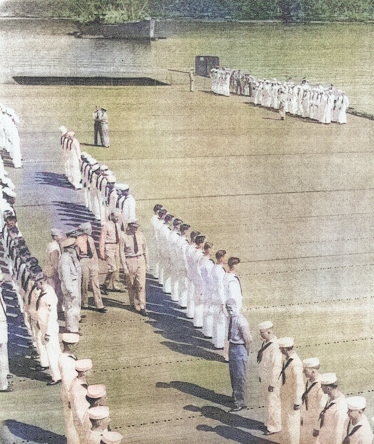 Captain Paul W. Watson of USS Coral Sea inspecting the S Division on the flight deck, 27 May 1944 [Colorized by WW2DB]