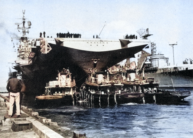 USS Ticonderoga preparing to depart Norfolk Naval Shipyard, Portsmouth, Virginia, United States, Apr 1957 [Colorized by WW2DB]