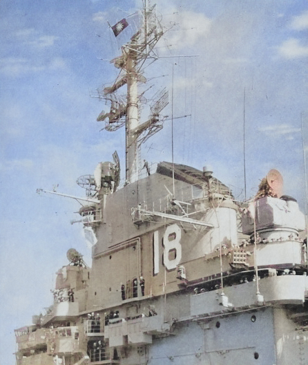 Superstructure of USS Wasp while off Taiwan, 10 Jan 1954; note Republic of China naval ensign for the occasion of visit by Chiang Kaishek [Colorized by WW2DB]