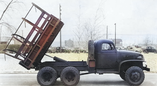 Factory photo of GMC CCKW 2 1/2-ton 6x6 closed cab short wheel base dump truck, Pontiac, Michigan, United States, 1941 [Colorized by WW2DB]