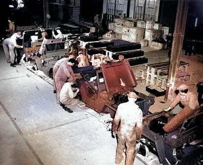 A complete jeep was turned out every three minutes at this assembly depot (No. 0-640) in Tidworth, Wiltshire, England, United Kingdom, 8 Sep 1943 [Colorized by WW2DB]