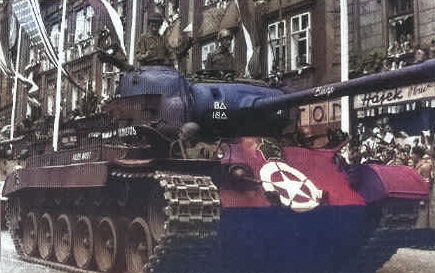 M26 Pershing tank of US 8th Armored Division on parade in Pilsen, Czechoslovakia, 1945 [Colorized by WW2DB]