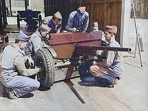 37 mm Gun M3 and its crew, Fort Benning, Georgia, United States, Apr 1942 [Colorized by WW2DB]