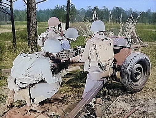 37 mm Gun M3 and crew at Fort Benning, Georgia, United States, Apr 1942 [Colorized by WW2DB]