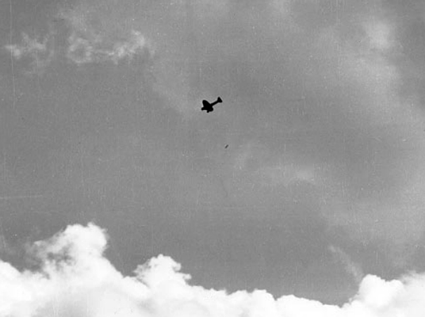 D3A1 Type 99 carrier dive bomber dropping a 250kg bomb over Pearl Harbor, US Territory of Hawaii, 7 Dec 1941