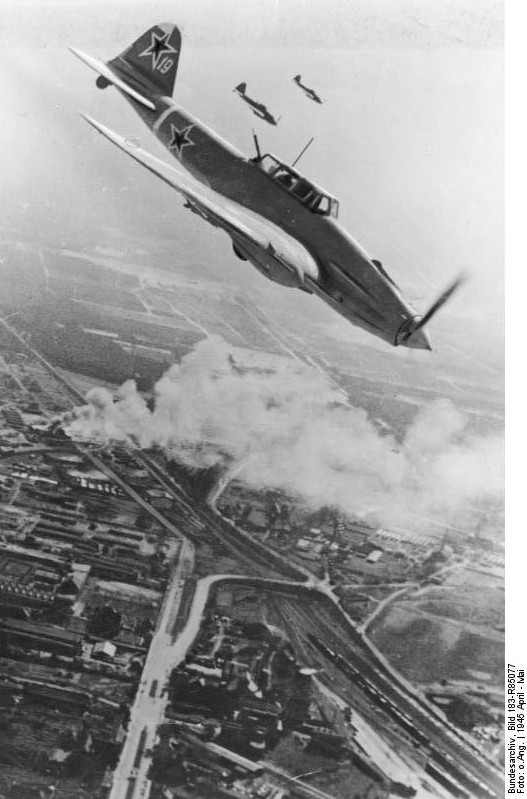 Il-2 Shturmovik aircraft in flight over Berlin, Germany, Apr-May 1945