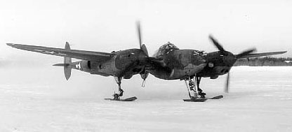 P-38G Lightning aircraft with retractable ski landing gear, Ladd Field, Fairbanks, US Territory of Alaska, winter of 1943-1944, photo 1 of 2