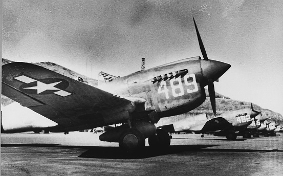 P-40N Warhawk fighters of the 333rd FS, 15th Air Wing lined up at Bellows Field, Oahu, US Territory of Hawaii, 1943