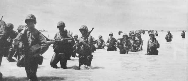 Men of 3rd Battalion, 6th Marine Division wading ashore at Green Beach, Betio, Tarawa Atoll, 22 Nov 1943