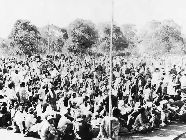 American soldiers resting during the Bataan death march, May 1942, photo 1 of 3