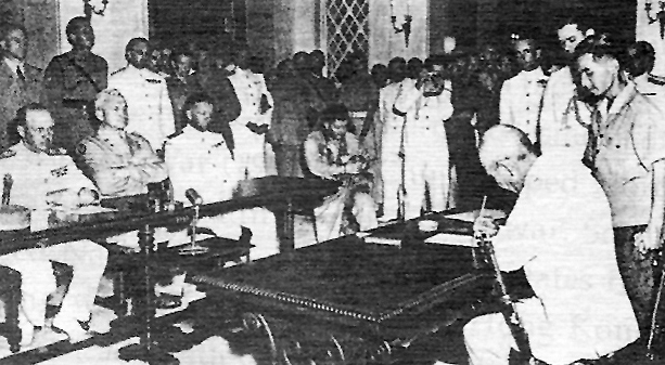 Representatives of China, United Kingdom, and Japan signing the Japanese instrument of surrender for Hong Kong, Government House, Hong Kong, 16 Sep 1945