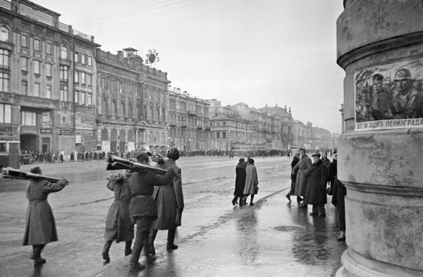 Russian men gathering wood for burning in Leningrad, Russia, Oct 1941