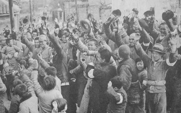 Japanese officers with Chinese civilians, Nanjing, China, 17 Dec 1937, photo 3 of 3