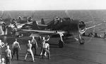 F6F Hellcat fighters going through launch procedures aboard the carrier Saratoga, off Gilbert Islands, early 1943.