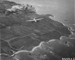 B-26 Marauder departing from a bomb strike on Auderville, France, Jun-Jul, 1944