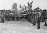 A badly damaged F4U-1A Corsair of Marine Squadron 216 flown by a wounded Lt Robert Marshall managed to return safely to Torokina, Bougainville, Solomons after an encounter with a swarm of A6M Zeros over Rabaul, New Britain, Dec 19 1943. Photo 2 of 5.