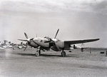 F-5E Lighting “Kay” of the 40th Photo Reconnaissance Squadron at Akyab Island airstrip, Burma, 1945 (now Sittwe, Myanmar). Note P-51B Mustangs.