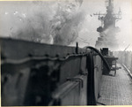 A special attack aircraft exploding on the flight deck of USS Intrepid as seen from the catwalks, off the Philippine Islands, 25 Nov 1944