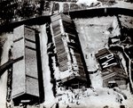 Allied Prisoners of War in the Narumi sub-camp No 11 in Nagoya, Japan, leave messages of thanks on the roofs of their huts for supplies dropped to them from aircraft from the USS Wasp (Essex-class), 28 Aug 1945