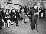 Captain Fred C Dickey taking command at the commissioning of USS Hancock, Navy Yard Annex, South Boston, 15 Apr 1944. Note Commandant First Naval District RearAdm Robert Theobald seated behind Dickey.