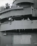 The island of the Lexington (Essex-class) with Capt Ernest Litch speaking with Cdr JM Lane on the upper level and VAdm Marc Mitscher speaking with VAdm John McCain on the Flag Bridge, 22 Aug 1944.