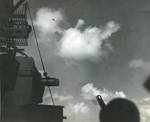 A Mitsubishi A6M Zero special attack aircraft diving on the carrier Lexington (Essex-class) off the Philippines, 5 Nov 1944. This plane struck the carrier directly outboard of the secondary conn causing moderate damage