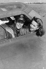 American entertainer Margie Stewart in the cockpit of a B-17 Flying Fortress during the filming of the movie 