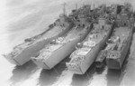 Japanese Navy landing ships No. 150, No. 101, No. 127, and No. 149 at Kure Naval Arsenal, Japan, 13 Mar 1944