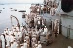 Japanese delegation leaving the USS Missouri in Tokyo Bay, Japan after signing the surrender documents, 2 Sep 1945, photo 2 of 2; note the temporary photographers platforms built outboard of the verandah deck