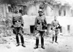 Lidice, Czechoslovakia 10 Jun 1942. Members of the SS police stand in the courtyard of the wrecked Horák family farm before the structures were totally destroyed.