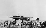 A Dornier Do-217 bomber on an airfield in Finland with reindeer in the foreground, 26 Jul 1941.