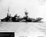 Heavy cruiser USS Chester in San Francisco Bay, California off Hunters Point Naval Shipyard after receiving new paint scheme Measure 32 Design 9D, 12 Jun 1944. Note OS2U Kingfisher aircraft on midship catapults